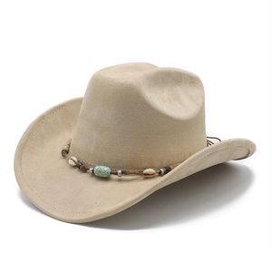 Detail of western cowboy hat featuring ethnic shell beads and suede texture finish
