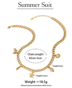 Detailed view of ocean theme gold chain necklace with starfish and seashell pendants