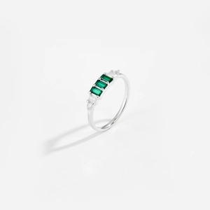 Elegant S925 sterling silver ring with three emerald-cut green zircons and side accents