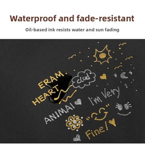 Waterproof gold and silver metallic markers writing on black paper with glossy finish