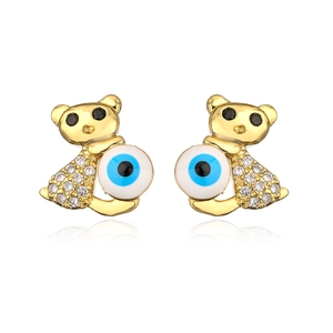 Macro view of 18K gold plated bear earrings with evil eye bead and sparkling zircon