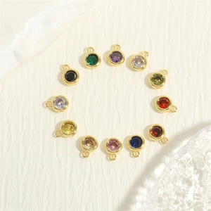Set of 12 colorful birthstone round pendants with golden metal frames for DIY jewelry