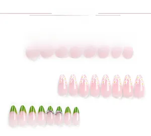 Detail of 24pcs green French nails with white flowers and 3D daisy rhinestone charms
