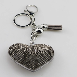 Sparkling heart keychain with grey rhinestones, silver carabiner, and luxury tassel