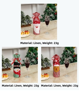 Detailed view of linen Christmas wine bottle covers with reindeer and snowman designs