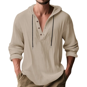 Detail of khaki linen hoodie shirt with three-button Henley neck and black drawstrings