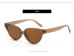 Close-up of brown jelly frame cat eye sunglasses showing CE and UKCA certification marks