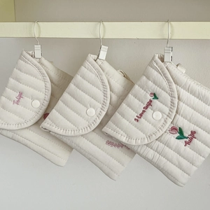 Quilted cotton menstrual pad pouch with floral tulip embroidery and button closure