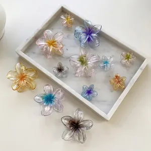 Tropical Frangipani gradient hair claws in various colors and sizes for versatile styling