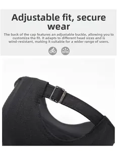 Detail view of adjustable metal buckle and stitching on black canvas baseball cap