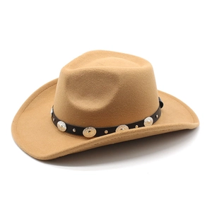 Detailed close-up of retro silver metal buckles on a black belt of a camel felt cowboy hat