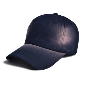 Close-up of navy blue baseball cap showing six-panel structure and reinforced stitching