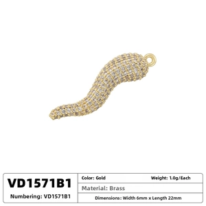 Detailed view of a gold-plated S-shaped chili pendant set with sparkling white zircons