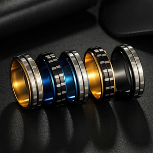 6mm rotating spinner rings in checkered patterns with stainless steel finishes