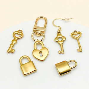 Set of six gold plated stainless steel heart lock and key charms for DIY jewelry