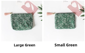 Detailed comparison of large and small green paisley coin purses with pink tassels