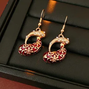 Vintage red enamel teardrop earrings with golden floral patterns and zircon accents