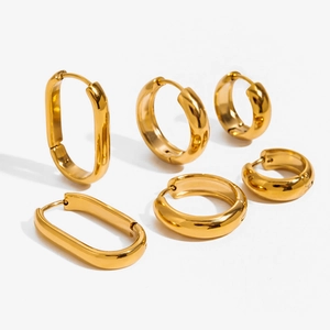 Polished 18K gold-plated stainless steel hoop and U-shaped earring set on white background