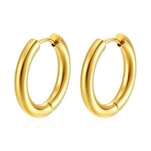 Close-up of a pair of classic golden stainless steel hoop earrings with glossy finish