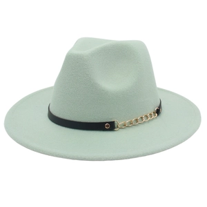 Detail view of mint green fedora with black leather strap and gold chain accent
