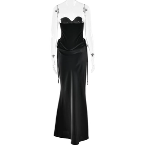 Detailed view of black satin strapless evening gown featuring ruched waist and fisheye hem