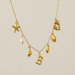 18k gold plated necklace featuring freshwater pearl, starfish pendants, and initial B letter