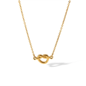 Close-up of golden stainless steel necklace featuring a minimalist knot-shaped pendant