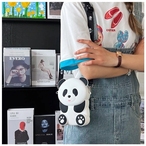 Cute 3D panda shoulder bag for kids with adjustable strap worn in a lifestyle setting