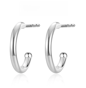 Macro shot of S925 sterling silver C-shaped stud earrings showing high polish finish