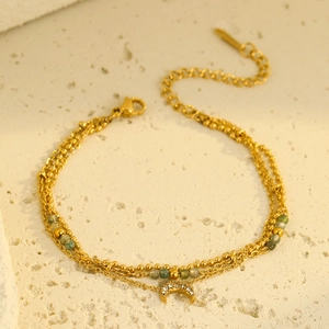 Three-layer gold stainless steel bracelet with green beads and zircon moon pendant