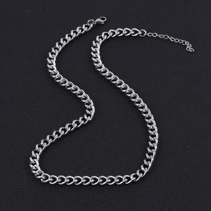 Close-up of silver Cuban chain necklace with lobster clasp and adjustable extension links