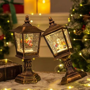 Vintage bronze Christmas street lamp lanterns with Santa and Snowman inside