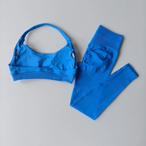 Dettagli del set yoga blu con leggings scrunch a vita alta e reggiseno sportivo
