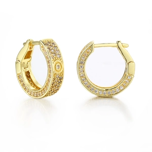 Detail of gold paved zircon hoop earrings with side screw motifs and polished finish