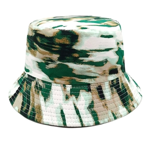 Detail of green camouflage tie-dye bucket hat showing fine stitching and durable canvas texture