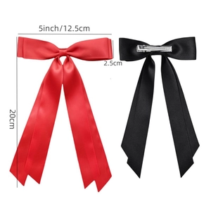 Glossy satin ribbon bow hair clips set in red and black with silver metal clips