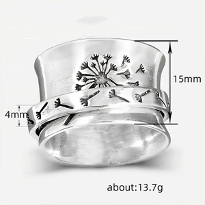 Vintage punk spinner ring with dandelion engraving and stainless steel wide band design