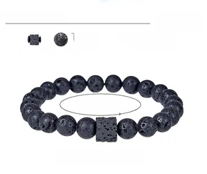 Macro detail of 8mm lava stone beads and square volcanic stone on beaded bracelet