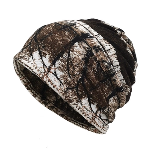 Breathable slouchy beanie with woodland camouflage pattern and warm knit texture