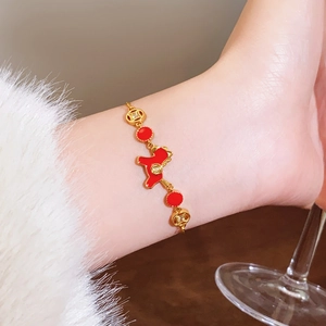 18k gold plated bracelet with red enamel and horse charms in elegant style