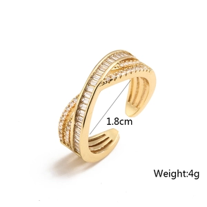 Detail view of gold wave ring with zircons showing 1.8cm diameter and 4g weight