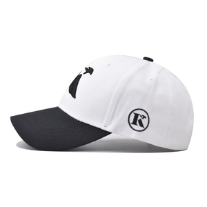 Two-tone cotton baseball cap in white and black with 3D embroidered K letter logo