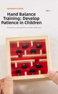 Detail of wooden hand balance maze toy with metal balls for concentration training