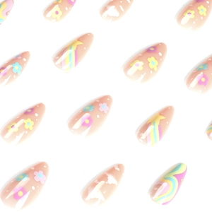 Rainbow and floral patterns on nude press on nails with clouds and star motifs