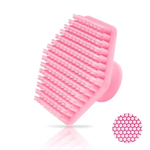 Macro view of pink hexagonal silicone face brush bristles for deep pore cleansing