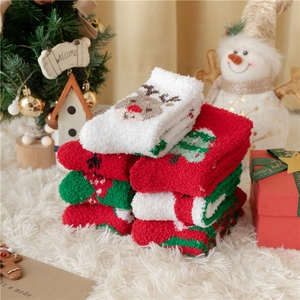 Plush Christmas coral fleece socks set featuring reindeer and tree patterns for winter