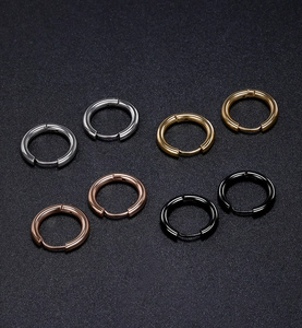 Polished titanium steel hoop earrings set in silver, gold, rose gold and black colors