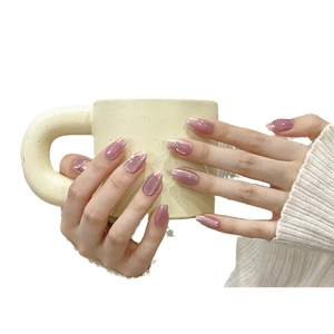 Handgemachte Mandel-Press-On-Nägel in Lila-Pink mit Katzenaugeneffekt und Strass