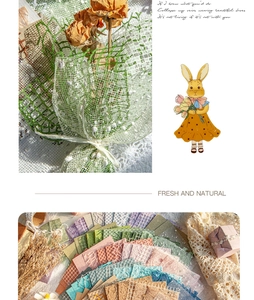 Detailed view of textured decorative papers for DIY scrapbooking and creative crafts