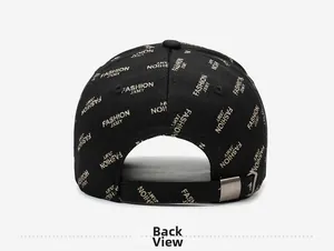 Detail view of the black baseball cap back with gold fashion print and metal buckle